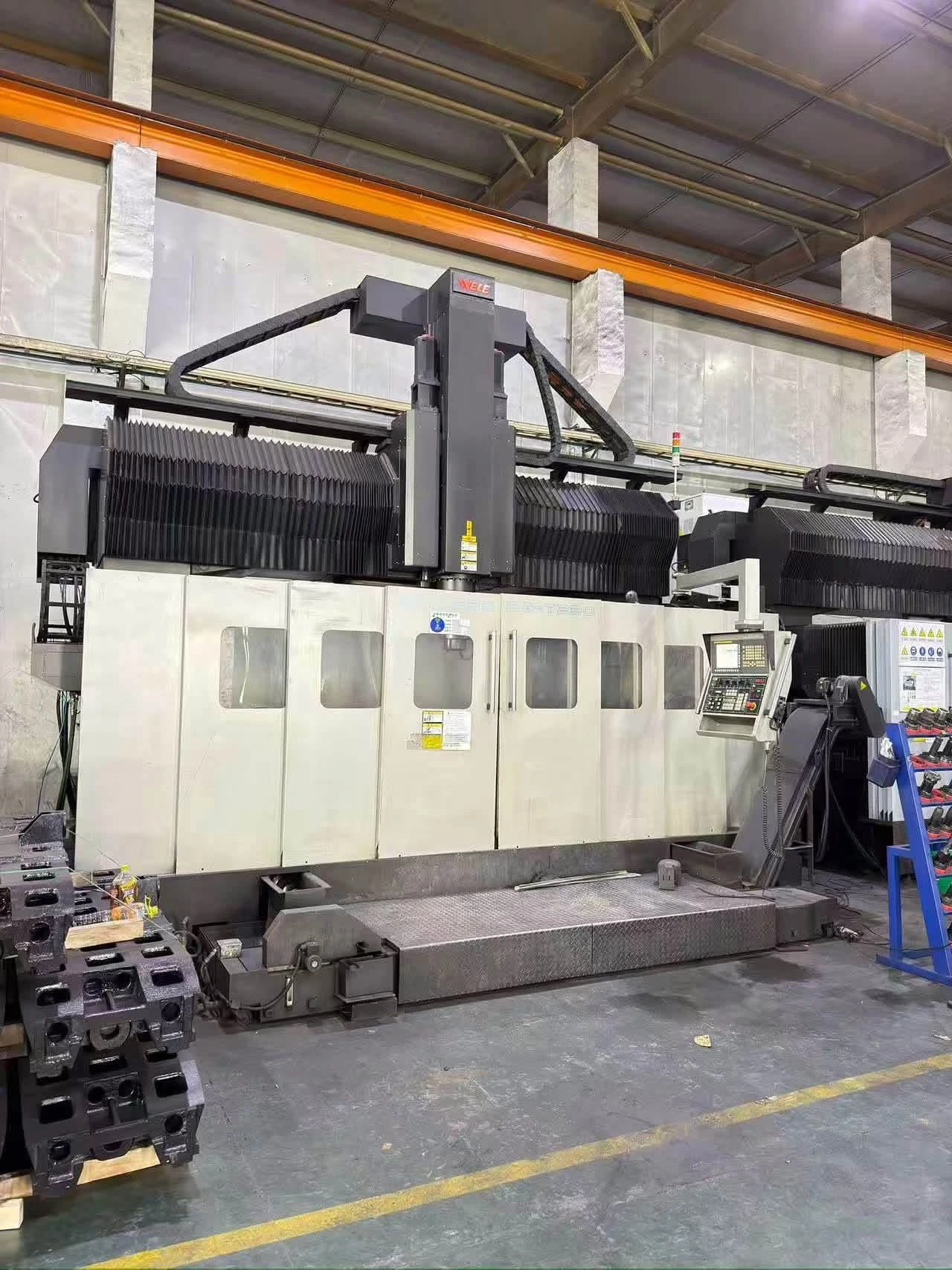 WELE  — WELE gantry machining center exterior